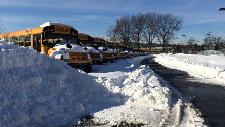 school buses in snow