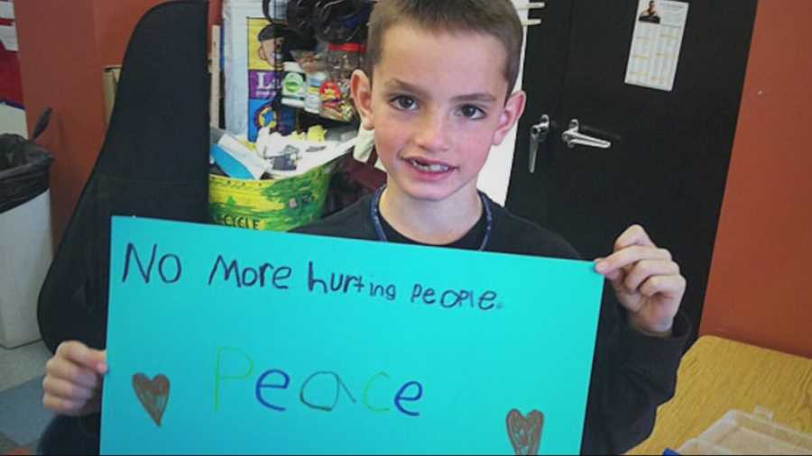An enduring image from the aftermath of the Boston Marathon bombings is a photo of 8-year-old Martin Richard holding a sign that reads "No more hurting people. Peace."
