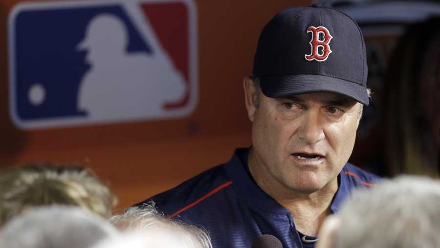 Boston Red Sox manager John Farrell talks to reporters before an interleague baseball game against the Miami Marlins, Tuesday, Aug. 11, 2015, in Miami.