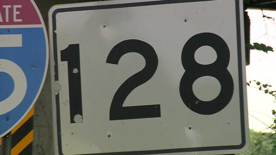 A close-up of a Route 128 sign in Massachusetts