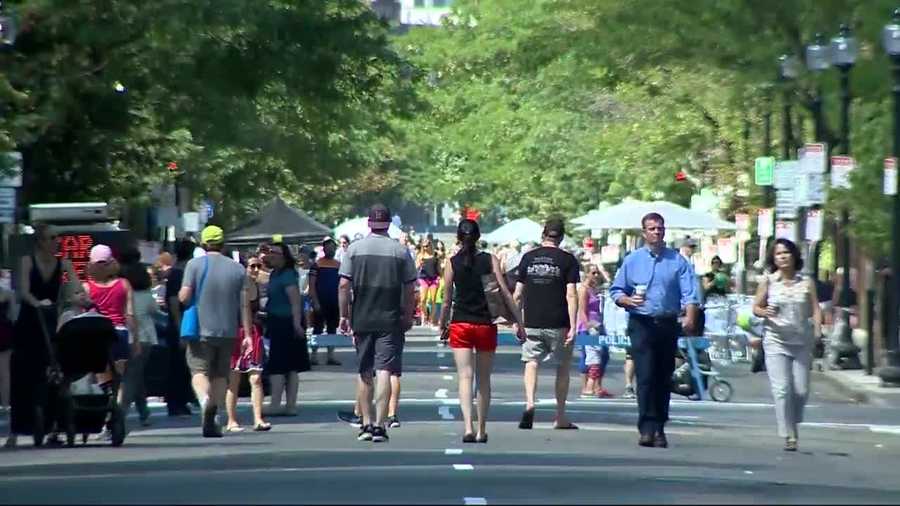 Boston's Newbury Street, home to dozens of shops and restaurants, was missing something Sunday: cars. The city transformed the street into a pedestrian walkway for a day, as a test.