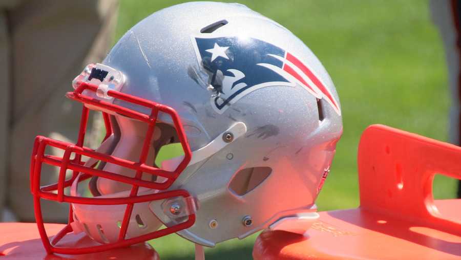 A Patriots player helmet shows some scuff marks after practice Tuesday.