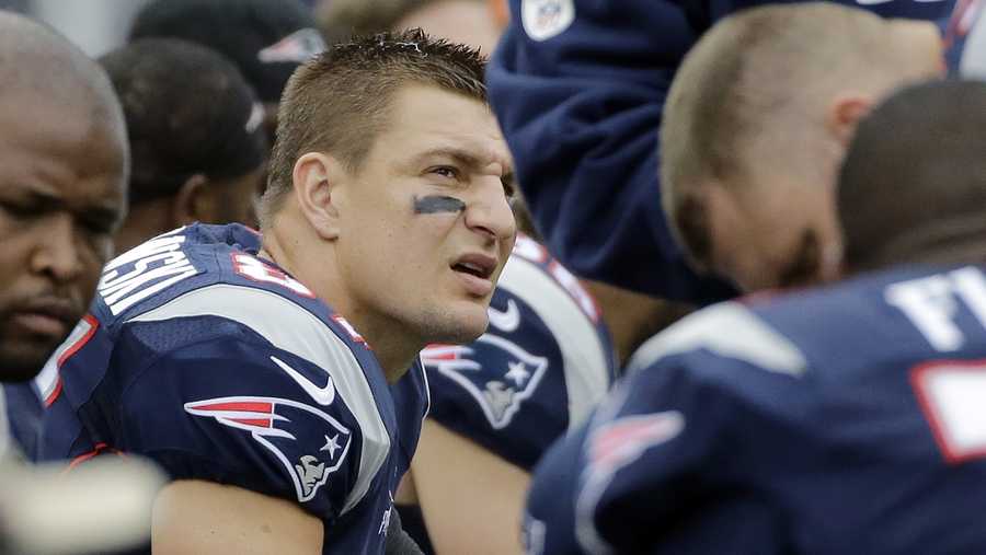 New England Patriots tight end Rob Gronkowski sits on the sideline during the second half of an NFL football game against the Buffalo Bills Sunday, Oct. 2, 2016, in Foxborough, Mass. 