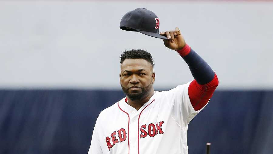 Boston Red Sox's David Ortiz tips his cap to the crowd during ceremonies before a baseball game against the Toronto Blue Jays in Boston, Sunday, Oct. 2, 2016.