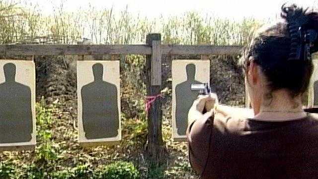 woman at gun range