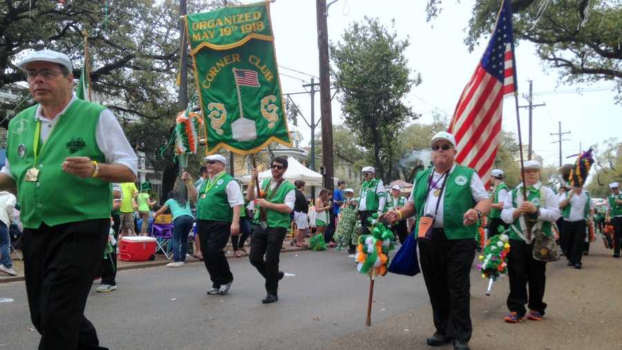 The Irish Channel parade features marching organizations who will often trade a flower for a kiss on the street.