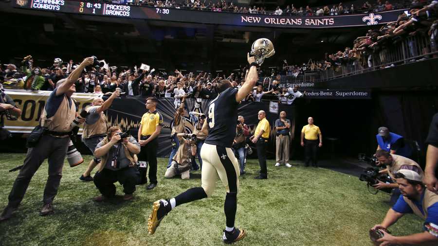 new orleans saints quarterback drew brees 9 reacts to the crowd as he runs off the field after an nfl football game against the new york giants in new orleans, sunday, nov 1, 2015 the saints won 52 49