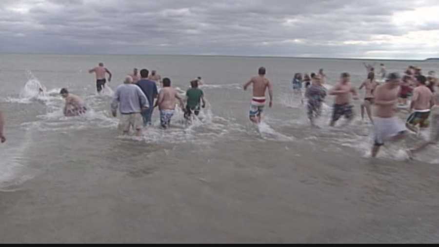 Firefighters are preparing for the annual Polar Bear Plunge at Bradford Beach in Milwaukee.