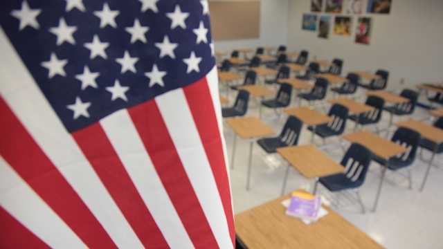The American flag in a school classroom