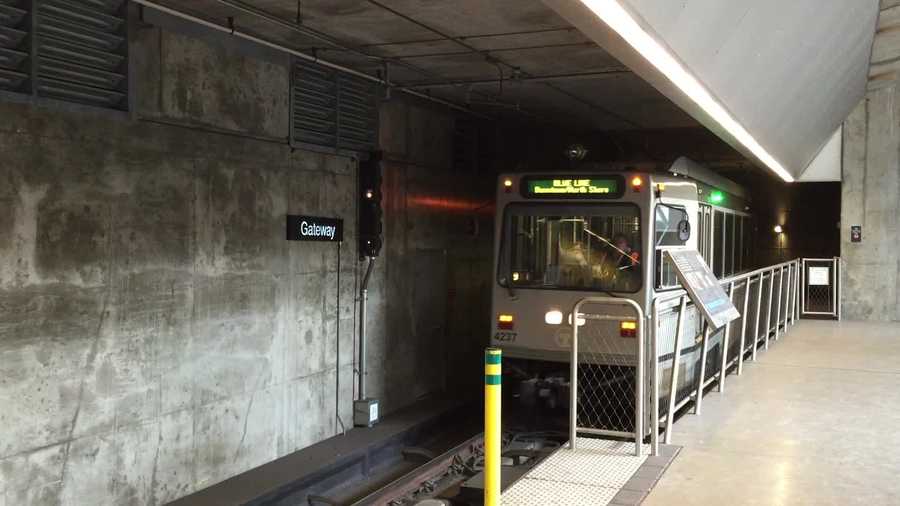 The T approaches the platform at a Port Authority subway station.