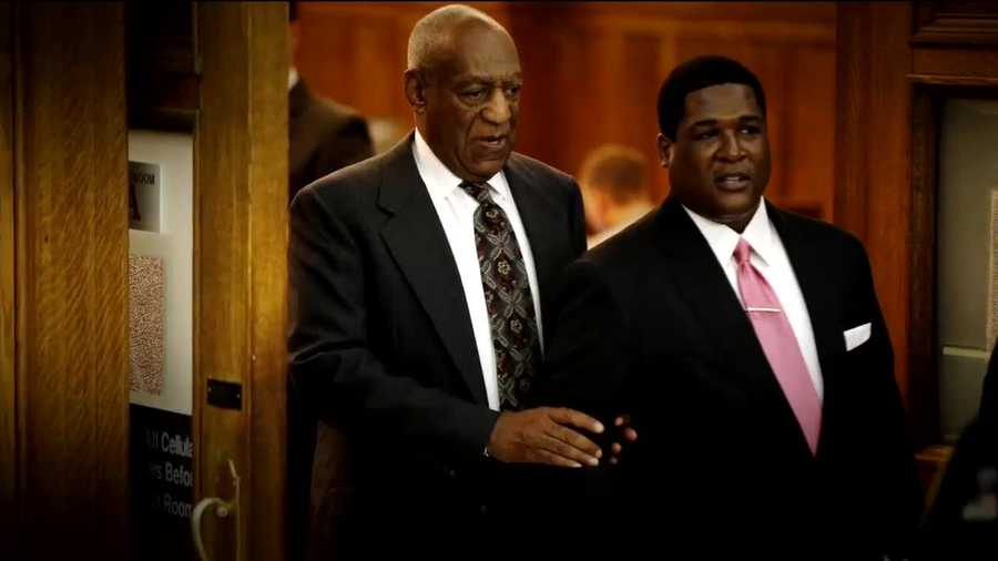 Bill Cosby in court, accompanied by an attorney.