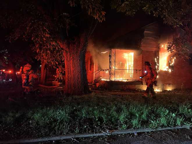 Crews battle fire at vacant home in Wyandotte neighborhood