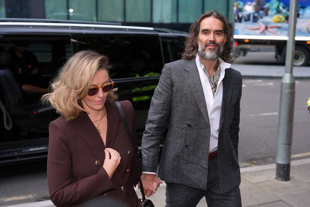 Russell Brand appears in London court for trial on rape and sexual assault charges