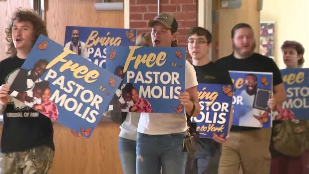 Community rallies for Haitian pastor detained after traffic stop
