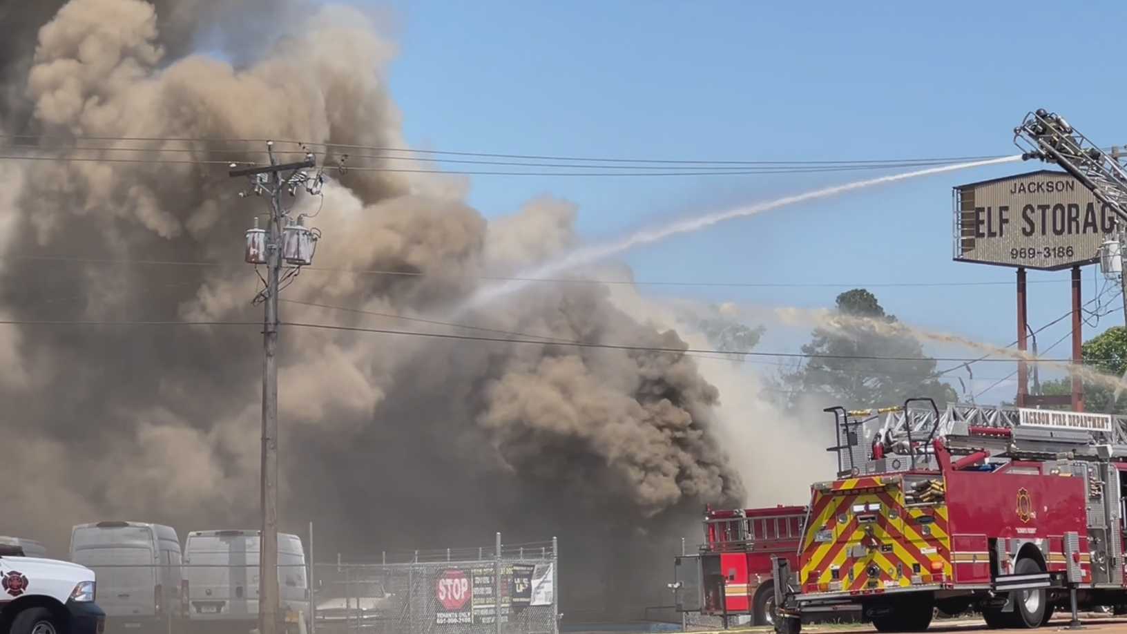 Dozens of fire trucks respond to massive Jackson storage facility blaze; Arrests underway