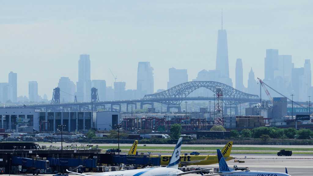 United flight landing in Newark strikes pole on New Jersey Turnpike, damages delivery truck
