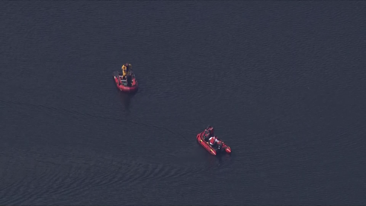 Crews search Mass. pond following report of distressed kayaker, police say