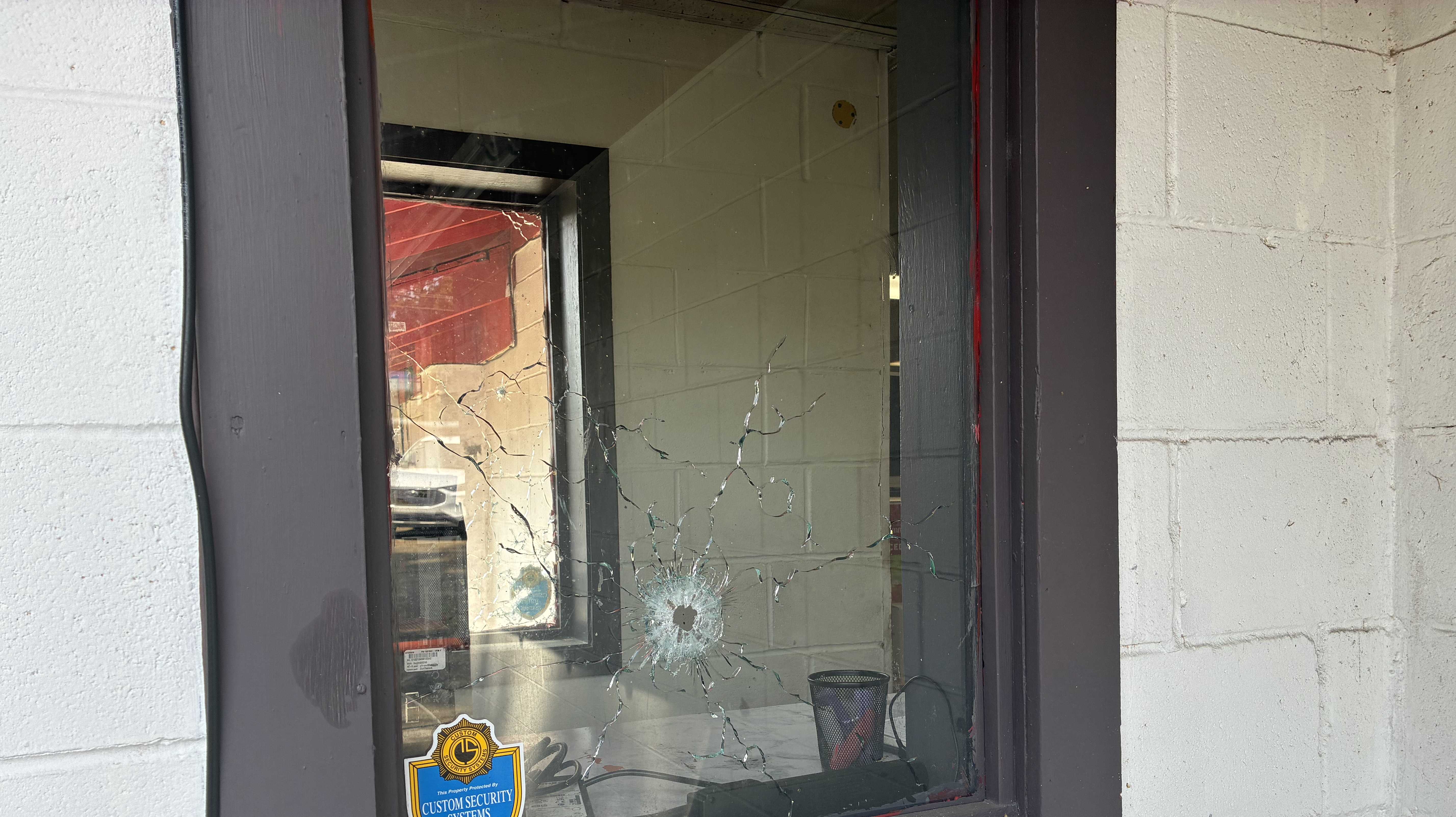 Two men killed, nine injured in Orchard Cafe parking lot shooting