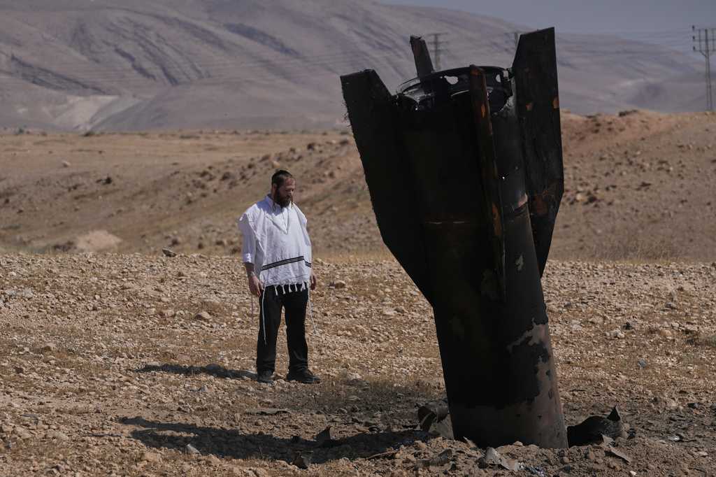 Trump urges Israel and Iran to stop shooting amid renewed strikes