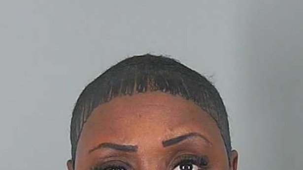 Woman accused of hitting, killing man with car, police say