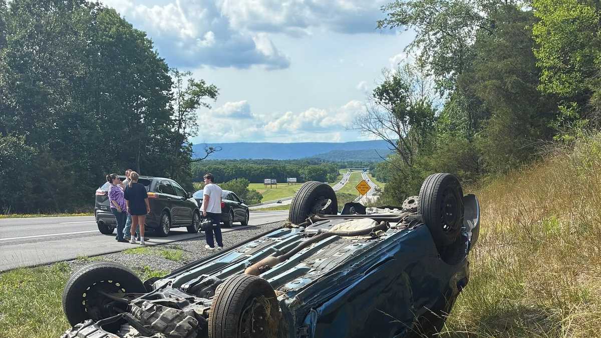 1 hospitalized after car flips onto roof off Route 322