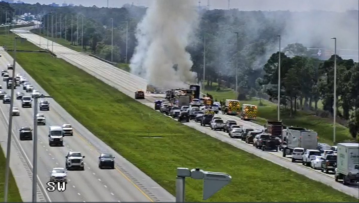 Charter bus fire closed I-95 southbound lanes in Hobe Sound; driver escaped unharmed