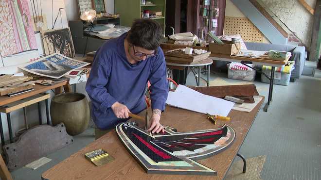 Pittsburgh artist crafts 32 custom pieces for NFL draft stage