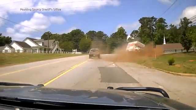 Georgia police PIT maneuver flips U-Haul during wild chase