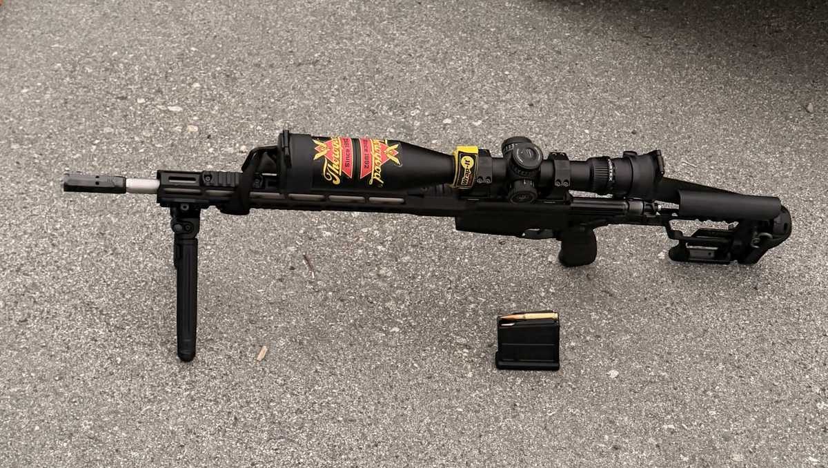 Loaded scoped rifle found during Marina car search