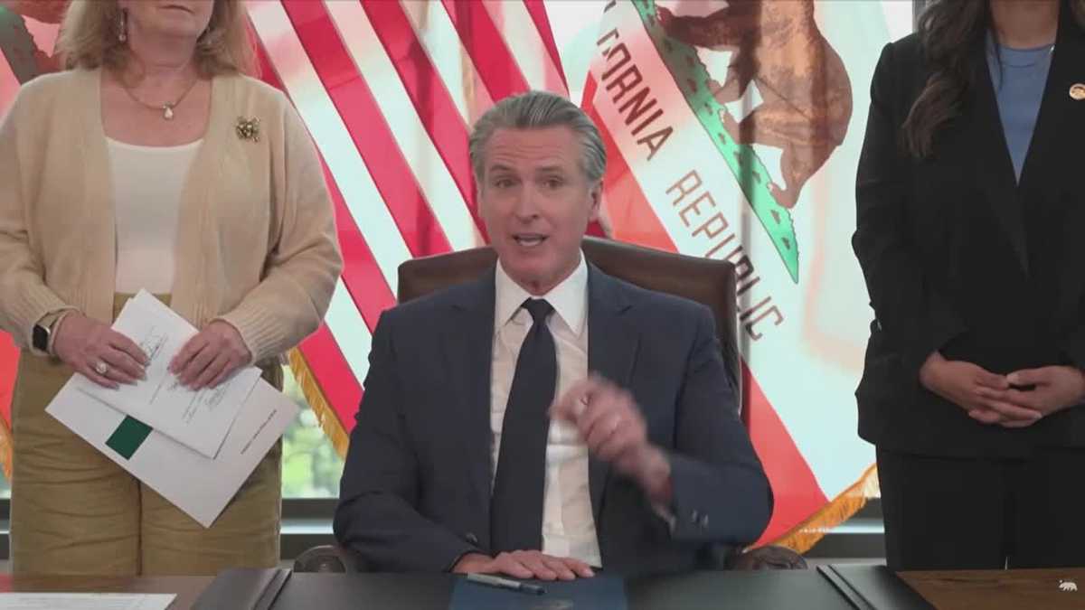 Newsom signs California election law before Tuesday primary, aiming to block federal interference