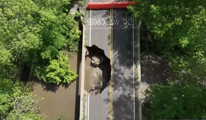 Two people were taken to a hospital after a bridge partially collapsed Friday night.