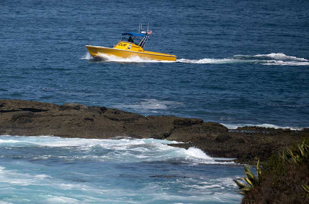 Authorities search for a girl swept into the ocean in Southern California