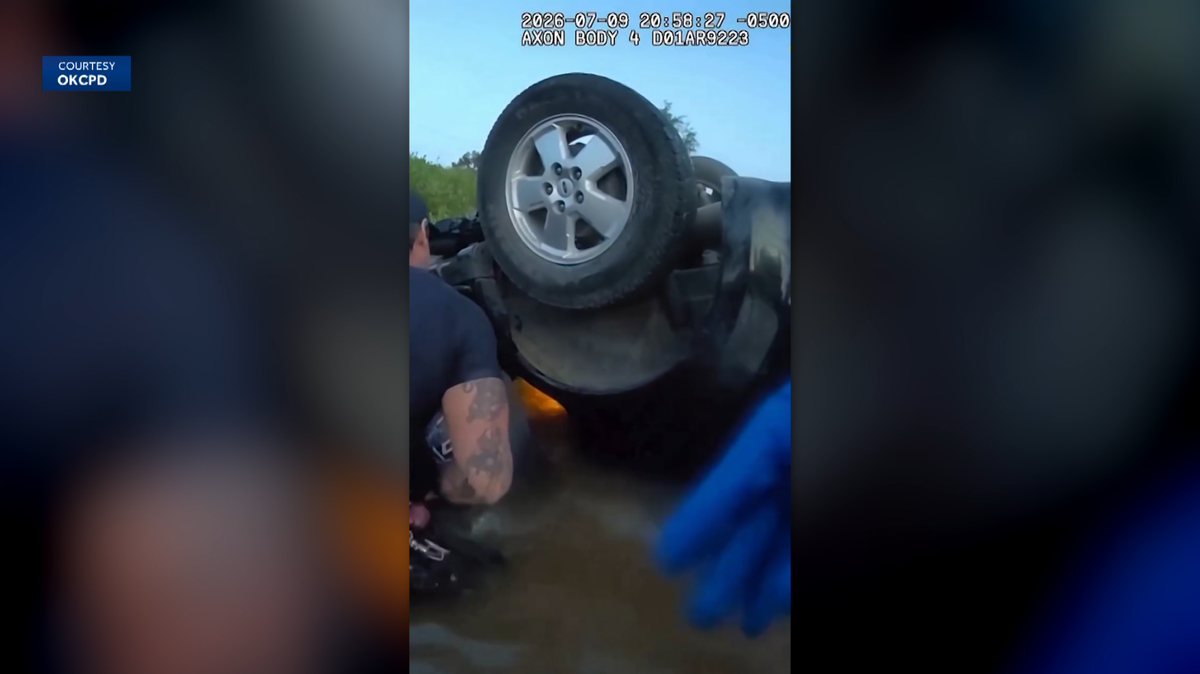 Video shows OKC emergency crews rescue driver from car overturned in creek