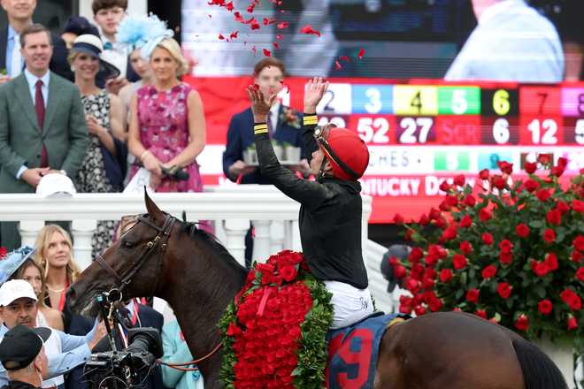 LOUISVILLE, KENTUCKY - MAY 02: Jockey Jose Ortiz of Golden Tempo celebrates in the winner&amp;apos;s circle after winning the 152nd running of the Kentucky Derby at Churchill Downs on May 02, 2026 in Louisville, Kentucky. (Photo by Rob Carr/Getty Images)