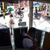 VIDEO: Motorcyclist crashes, is catapulted into moving bus