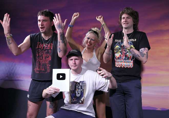 INDIO, CALIFORNIA - APRIL 13: Amyl and the Sniffers attend YouTube + Coachella 2025 at the Empire Polo Club, on April 13, 2025 in Indio, California.  (Photo by Rodin Eckenroth/Getty Images for YouTube Music)