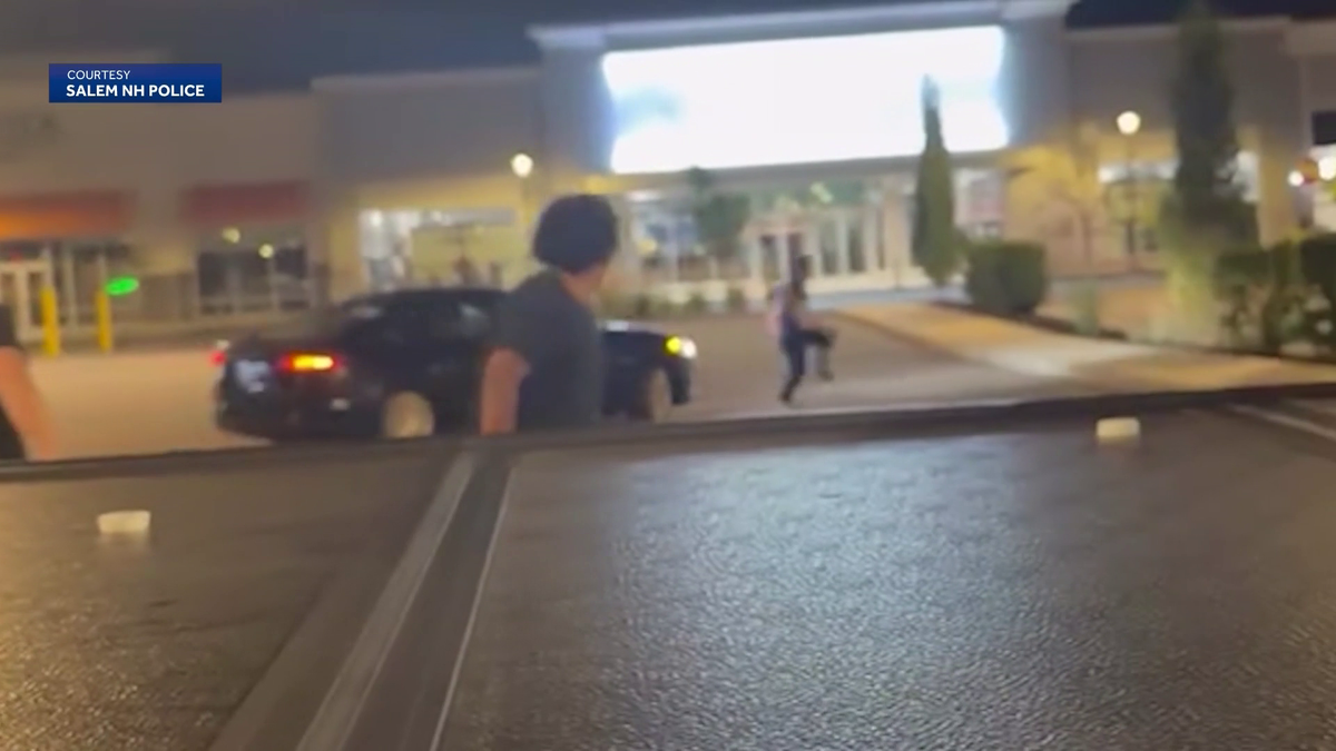 NH police try to track down driver of car shown in video driving at pedestrian