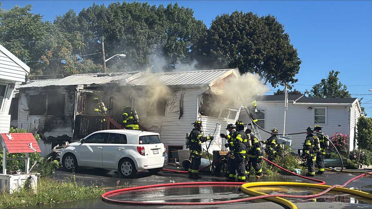Firefighters battle blaze at Malden mobile home park
