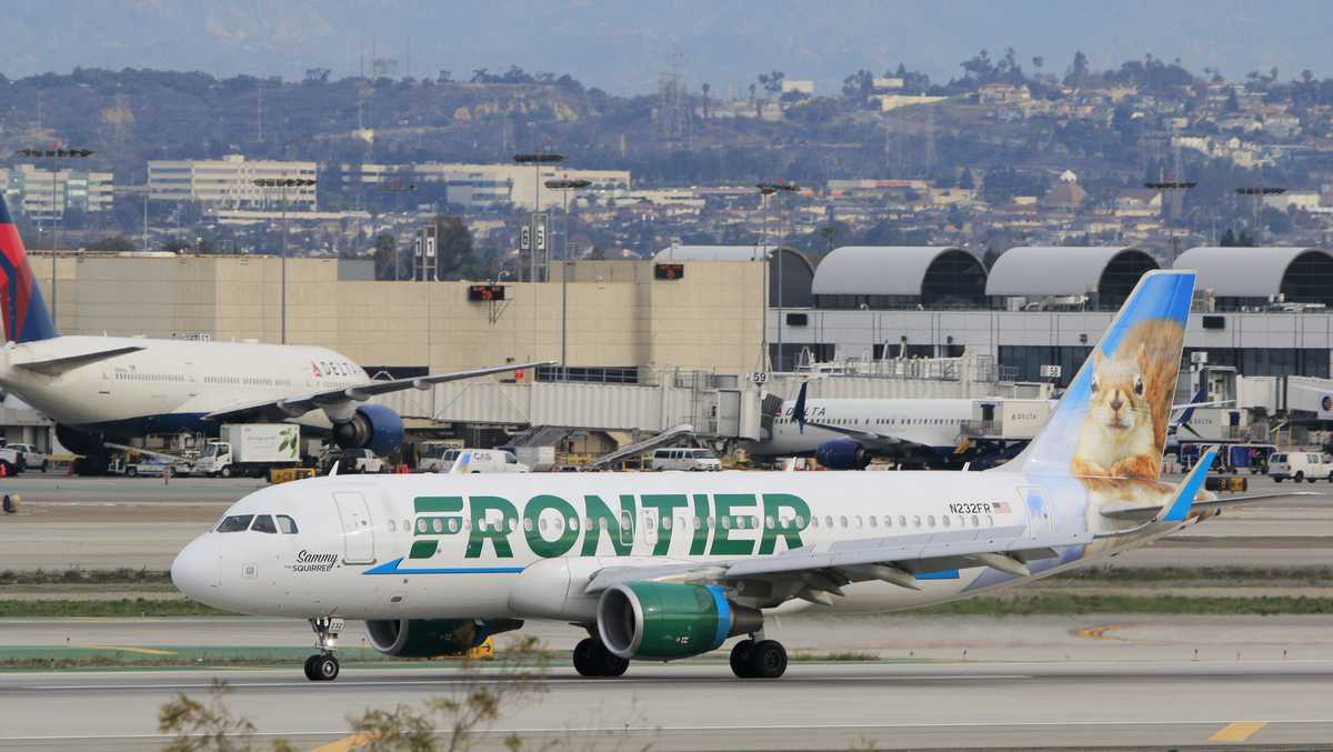 FAA investigates close call between Frontier plane and trucks at LAX: 'It was real close'