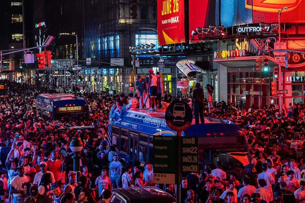 Mayhem mars euphoria as New York City celebrates the Knicks' first championship in 53 years