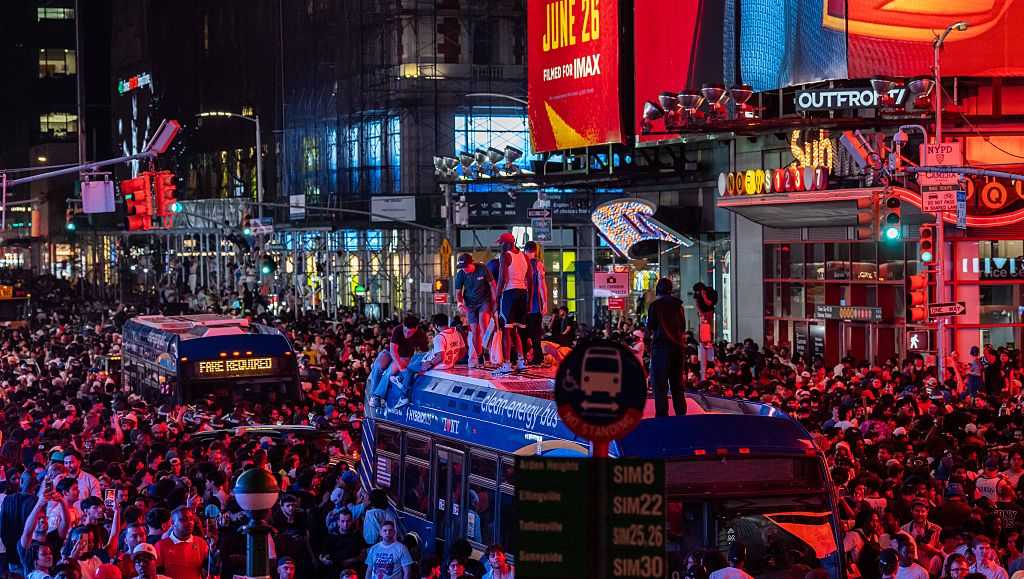 Mayhem mars euphoria as New York City celebrates the Knicks' first championship in 53 years