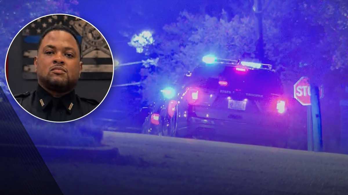 Law enforcement escorts Deputy Terrian Bailey to Biloxi crime lab