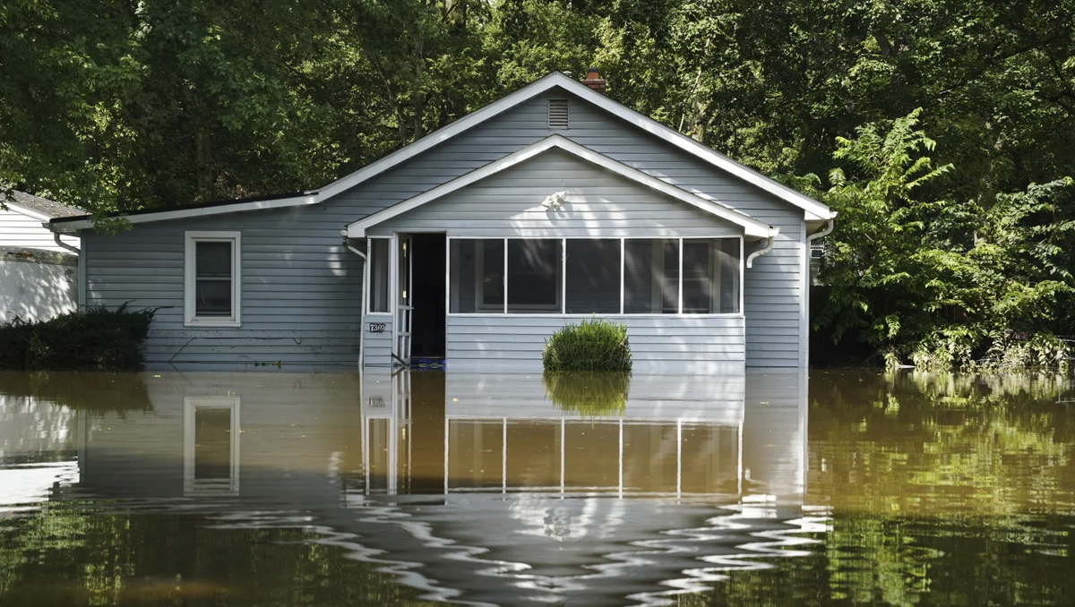 At least 7 people have died from days of heavy rain and record-setting flooding in Indiana