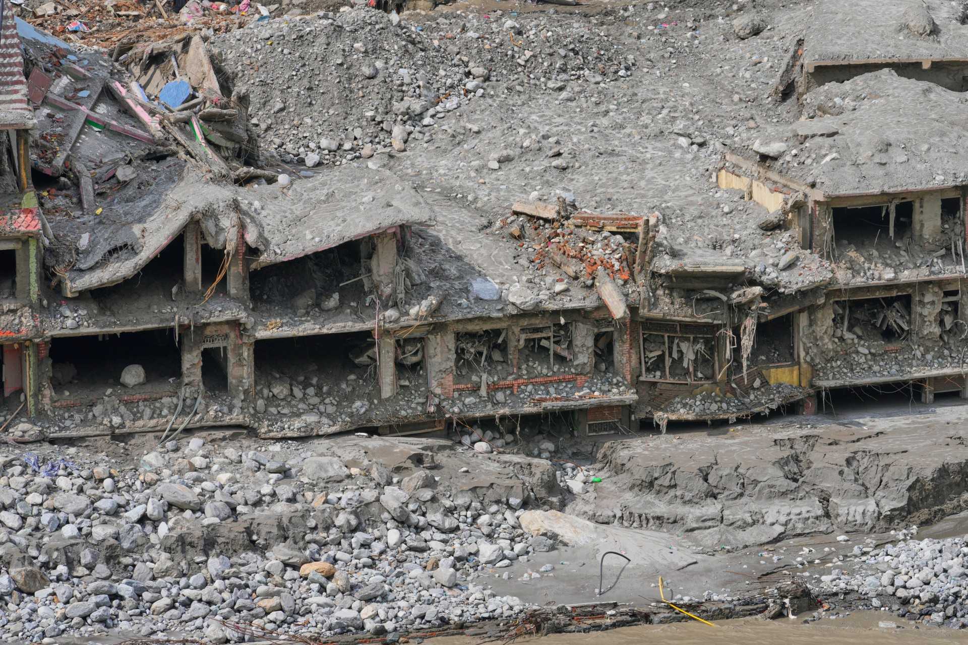 Nepal's leader says recent floods serve as 'warning to the world' about climate change