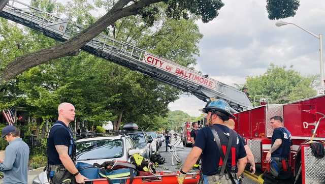 2 firefighters injured in rowhome fire in Hampden neighborhood, officials say