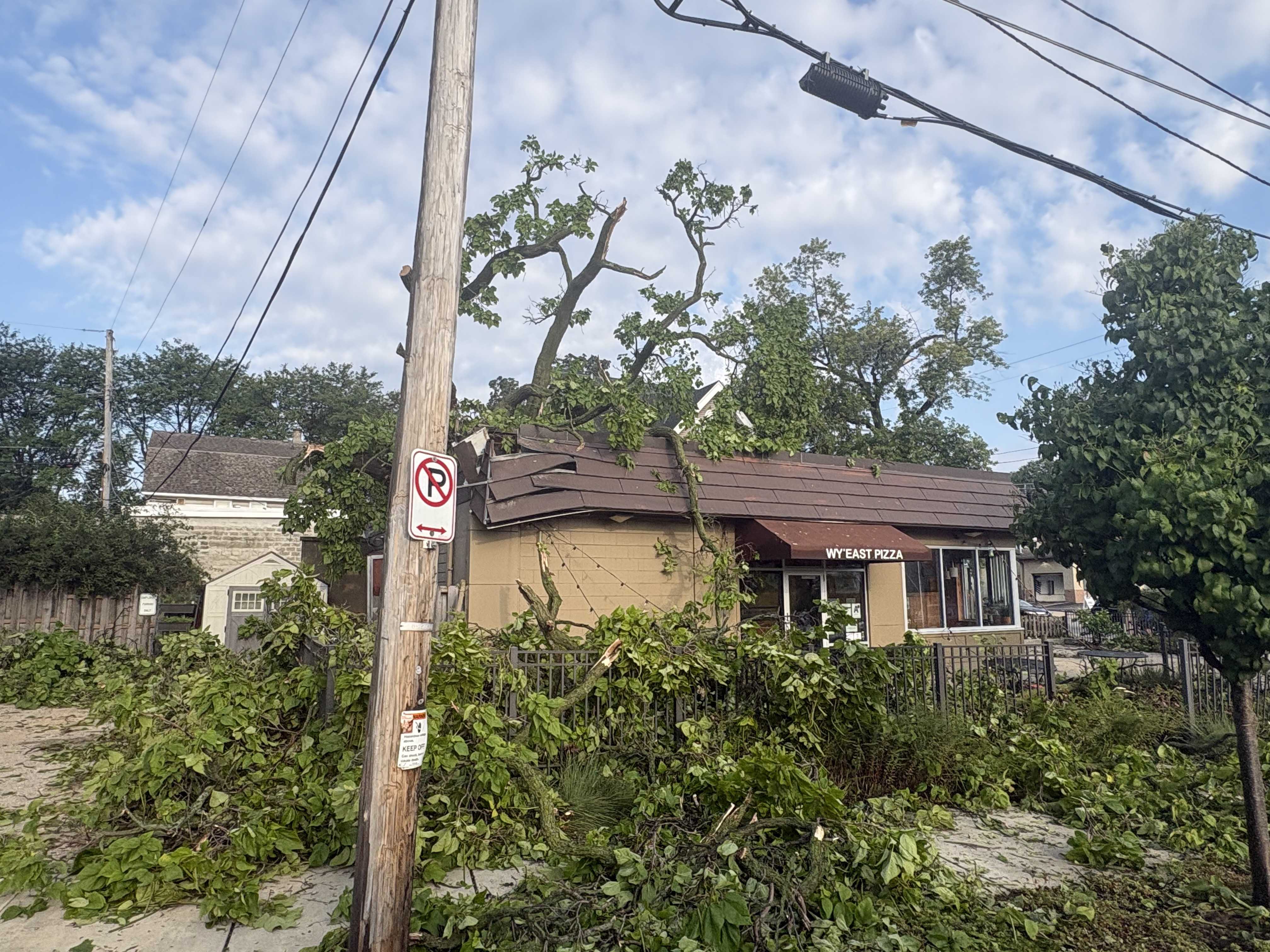 Storms tear through Milwaukee, crushing cars and damaging homes - WISN