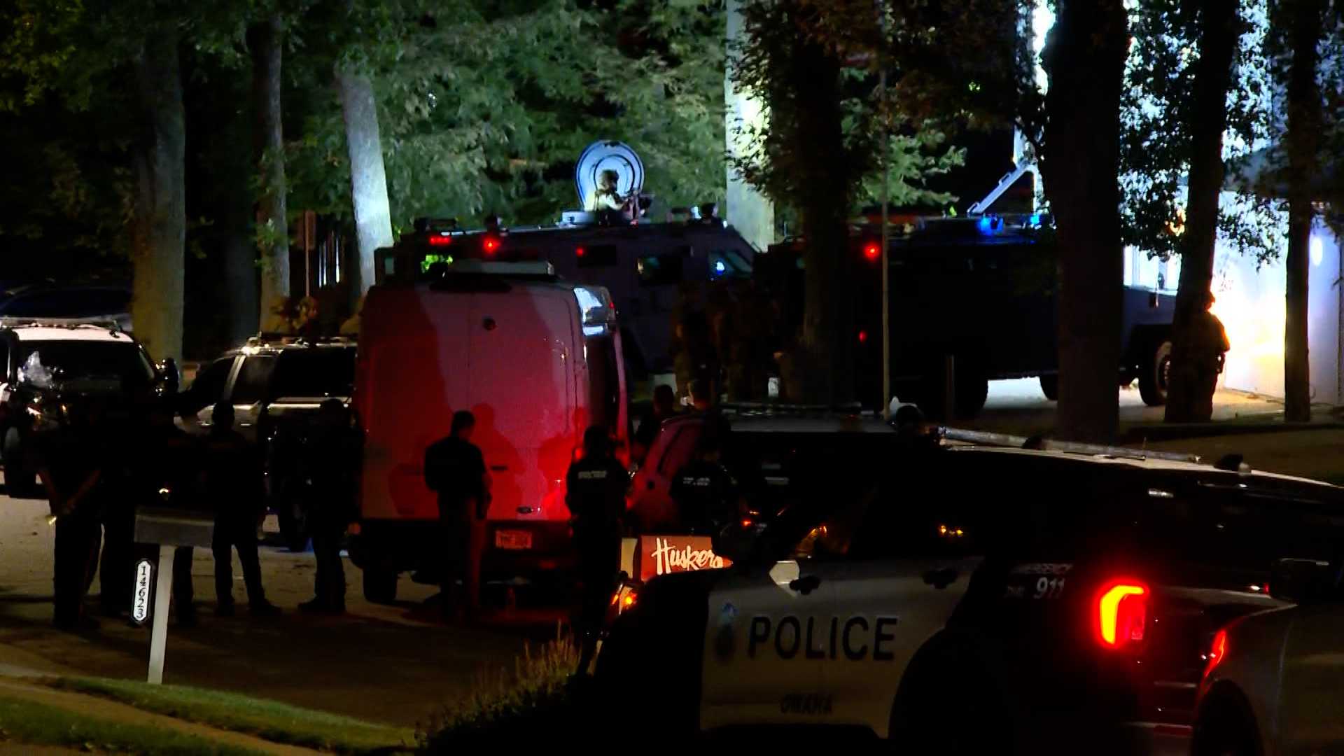 Omaha police say man with felony warrant forced woman out of home at gunpoint