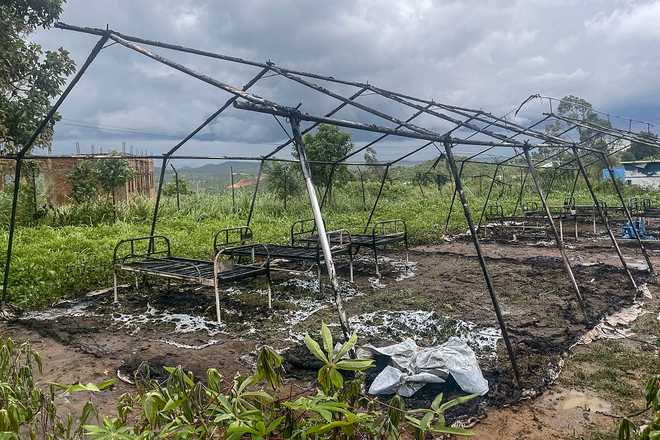 A view of burnt infrastructure at a hospital in Rwampara on May 21, 2026, after protesters set it on fire, after they were apparently denied access to the bodies of relatives killed in the latest Ebola outbreak.