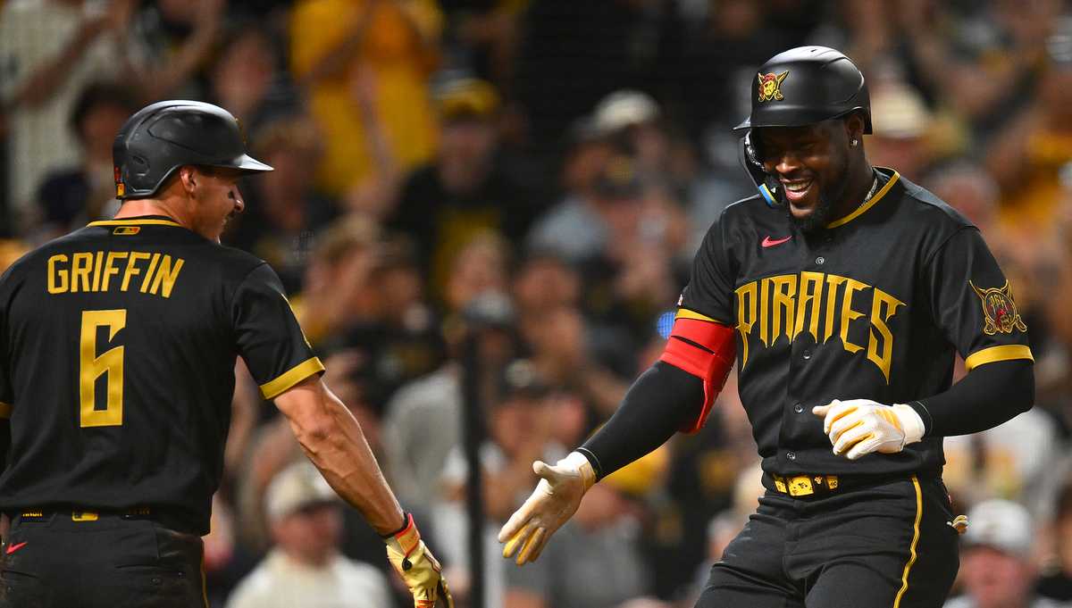 Cruz slams another HR as Pirates win series opener