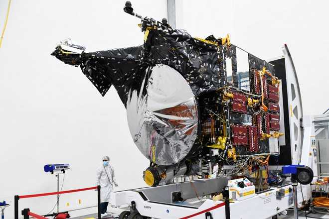 The Psyche spacecraft is prepared inside a clean room at NASA's Jet Propulsion Laboratory (JPL) in Pasadena, California, on April 11, 2022. - Psyche will launch from Cape Canaveral, Florida, in August 2022 to enter orbit in space around an asteroid, also named Psyche, in 2026 to study the metal-rich asteroid and learn more about it's origin and composition. (Photo by Patrick T. FALLON / AFP) (Photo by PATRICK T. FALLON/AFP via Getty Images)